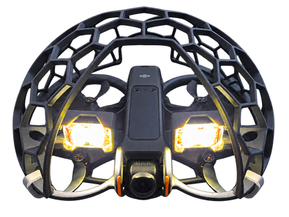 Freigestellter DJI Avata 2 Cage mit eingeschalteten FIREHOUSE ARC V Leuchten und grauen Clips – Anwendungsbeispiel, Drohne und Leuchten nicht enthalten.